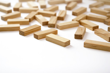 Wooden rectangles arranged differently over a white background. Copy space. Cover background...