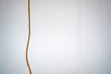 Minimalism on white background with rope