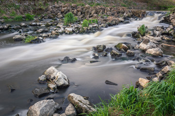 Water cascades on Jeziorka river near Konstancin-Jeziorna, Masovia, Poland.