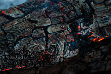 Red lights in the burning coals