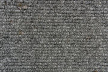 Synthetic fiber carpet