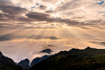 Sunrise with mist on hills 