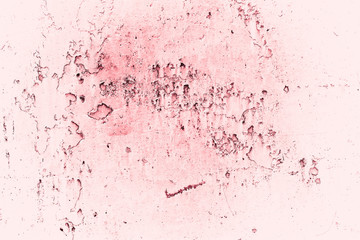 Vintage pink background. Rough painted wall of fiesta color. Imperfect plane of rosy colored. Uneven old decorative toned backdrop of rouge tint. Texture of pink hue. Ornamental stony surface.
