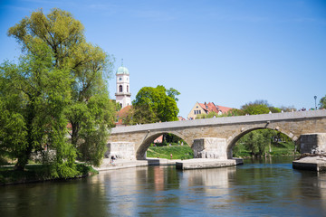 Fototapeta na wymiar View from the stone bridge in Regensburg. Stone bridge