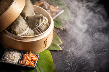Zongzi, delicious fresh hot steamed rice dumplings in steamer. Close up, copy space, famous asian tasty food in dragon boat duanwu festival
