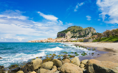 Long beach and blue sea near Cefalu, Sicily, Italy