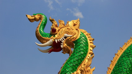 Fototapeta na wymiar fantasy Animals Golden Green Naga Elephant Local Tradition Art In Buddhist Temple In Thailand