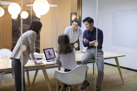 Business people talking in board room 