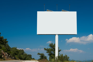 large blank board at the roadside