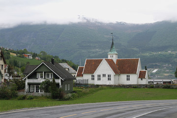 Fototapeta na wymiar Settlement and church. Olden, Norway
