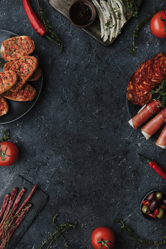 Spanish tapas on black background. Food dark background with copy space.