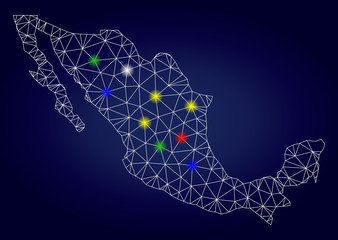 Bright mesh vector Mexico map with glare light spots. Carcass model for political purposes. Abstract lines, dots, light spots are organized into Mexico map. Dark blue gradiented background.