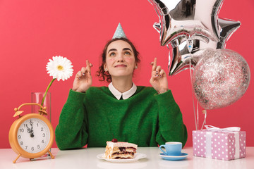 Intrigued young nerd student girl celebrating her birthday