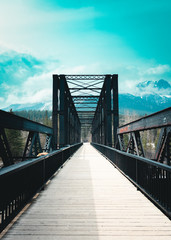 Historic Canmore Engine Bridge is a truss bridge over the Bow River in the Canadian Rockies of Alberta. The bridge was built by the Canadian Pacific Railway in 1891 to serve a coal mine.