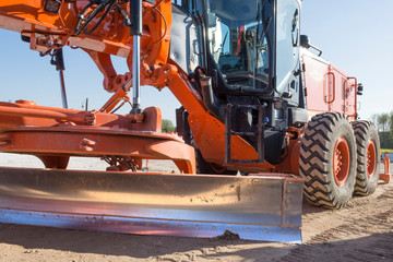 niveleuse chantier de construction