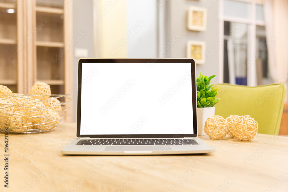 Wall mural laptop showing blank screen on work table front view in home- image