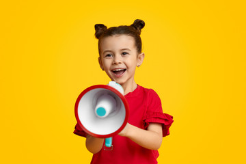 Cheerful girl with speaker