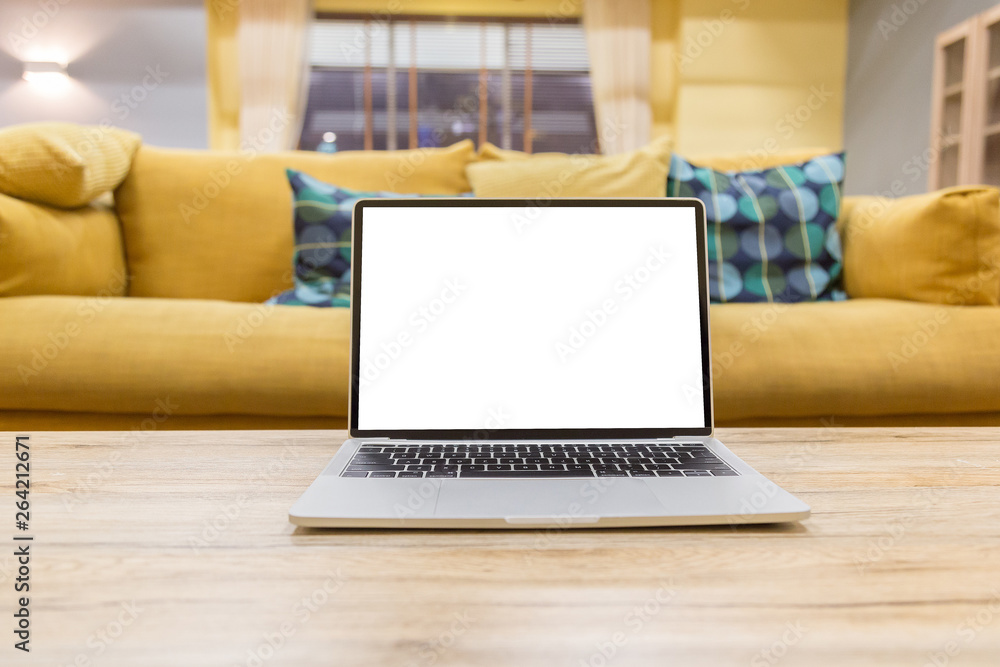 Wall mural laptop showing blank screen on work table front view in home- image