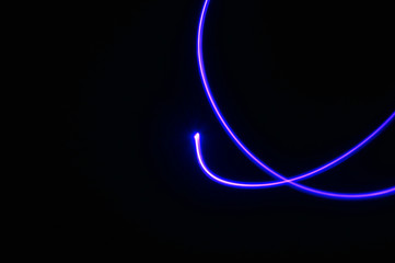 Abstract blue light on black background