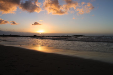 coucher de soleil sur une plage en Afrique du Sud
