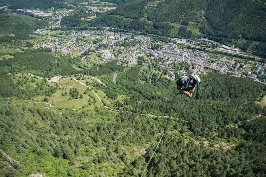 Tomer Sisley during his bungee jump from a cliff, Occitanie, Florac, France