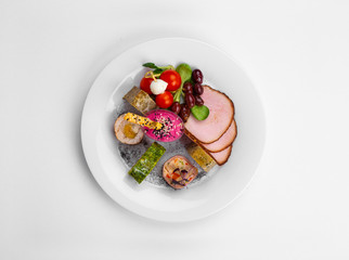 Terrine with smoked chicken and ghebe, Cighir with quail eggs, Spinach roll with cream cheese and salmon, Chicken mash roulade in bacon cake, Smoked pork chops, Humus with the poor, Pulp rolls and can