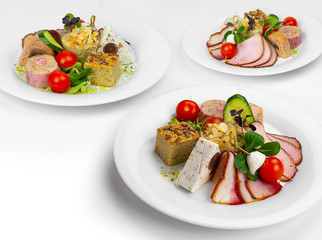 Terrine with smoked chicken and ghebe, Cighir with quail eggs, Spinach roll with cream cheese and salmon, Chicken mash roulade in bacon cake, Smoked pork chops, Humus with the poor, Pulp rolls and can