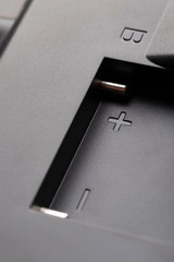 Brilliant contacts of the connector for the battery in a plastic black case