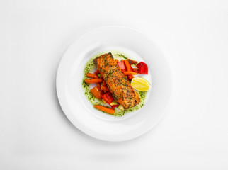 Dried salmon fillet, baked vegetables, flavored with Provence herbs, pesto, aromatic herbs