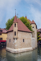 The daylight view of medieval insular palace Palais de l'Ile jail in Annecy city, France