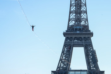 a man walk on a highline between Eiffel tower and Trocadero, Île de France, Paris, France