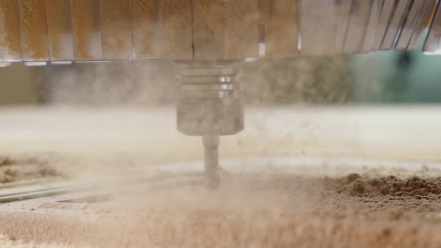 Chipboard milling on the machine with CNC closeup