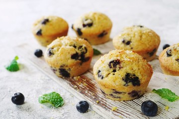 Homemade Lemon Blueberry Muffins with sugar topping, selective focus