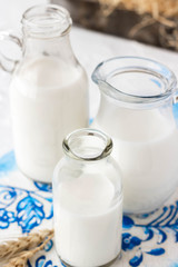 Milk in bottles of various shapes and sizes