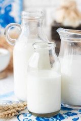 Milk in bottles of various shapes and sizes