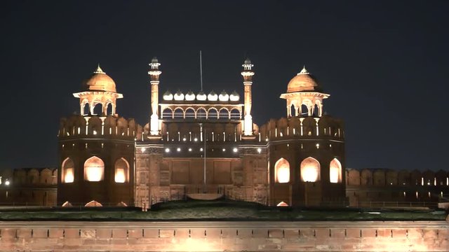 a night shot of red fort at chandni chowk in old delhi, india