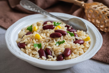 Rice with red beans in bowl .
