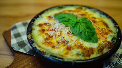 Spinach bake cheese  In a black cup