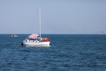 Seascape with pleasure yacht