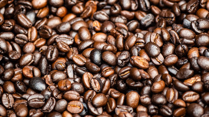 Many roasted black coffee beans. Concept Love with coffee.