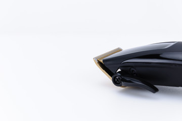 Close up of Hair Barber Clippers, Haircut accessories on white background with copy space. Focus on...
