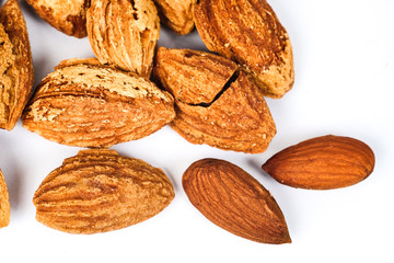 Dry Almonds nuts with shell on white background ,health food.