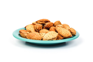 Dry Almonds nuts with shell on white background ,health food.