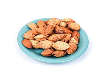 Dry Almonds nuts with shell on white background ,health food.
