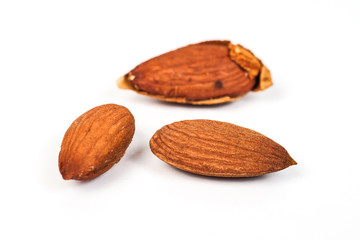 Dry Almonds nuts with shell on white background ,health food.