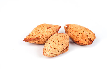 Dry Almonds nuts with shell on white background ,health food.