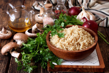 Cooked quinoa in a wooden bowl