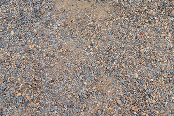 Colorful sand or pebble texture. Seamless texture on ground texture.