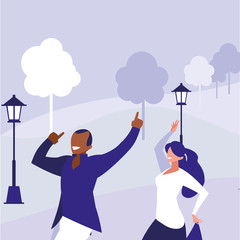 young interracial couple dancing in the park