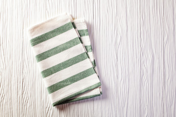 checkered napkin on white table